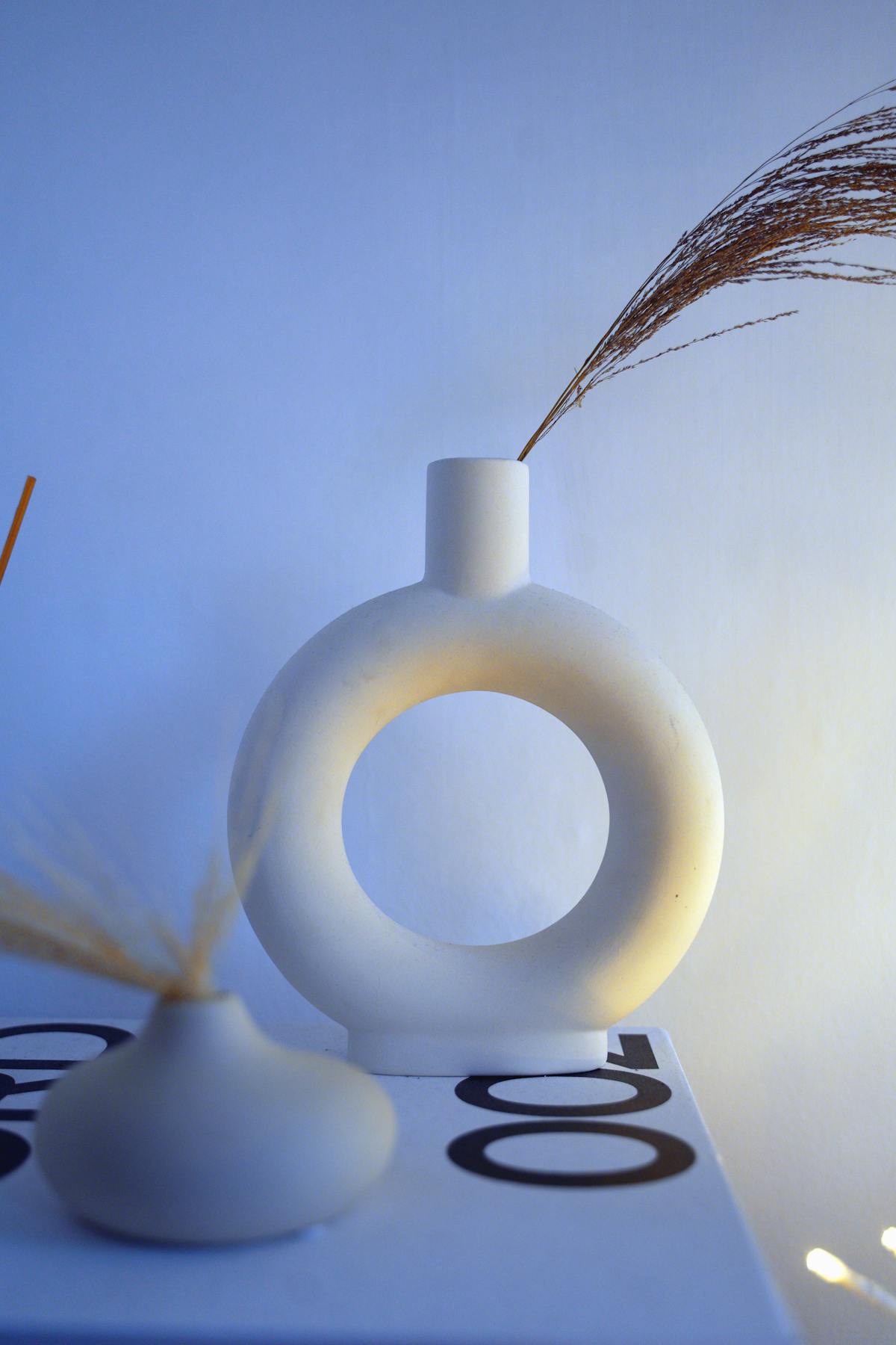 Dynamic Sand Art Frame on modern desk displaying flowing sand landscape
