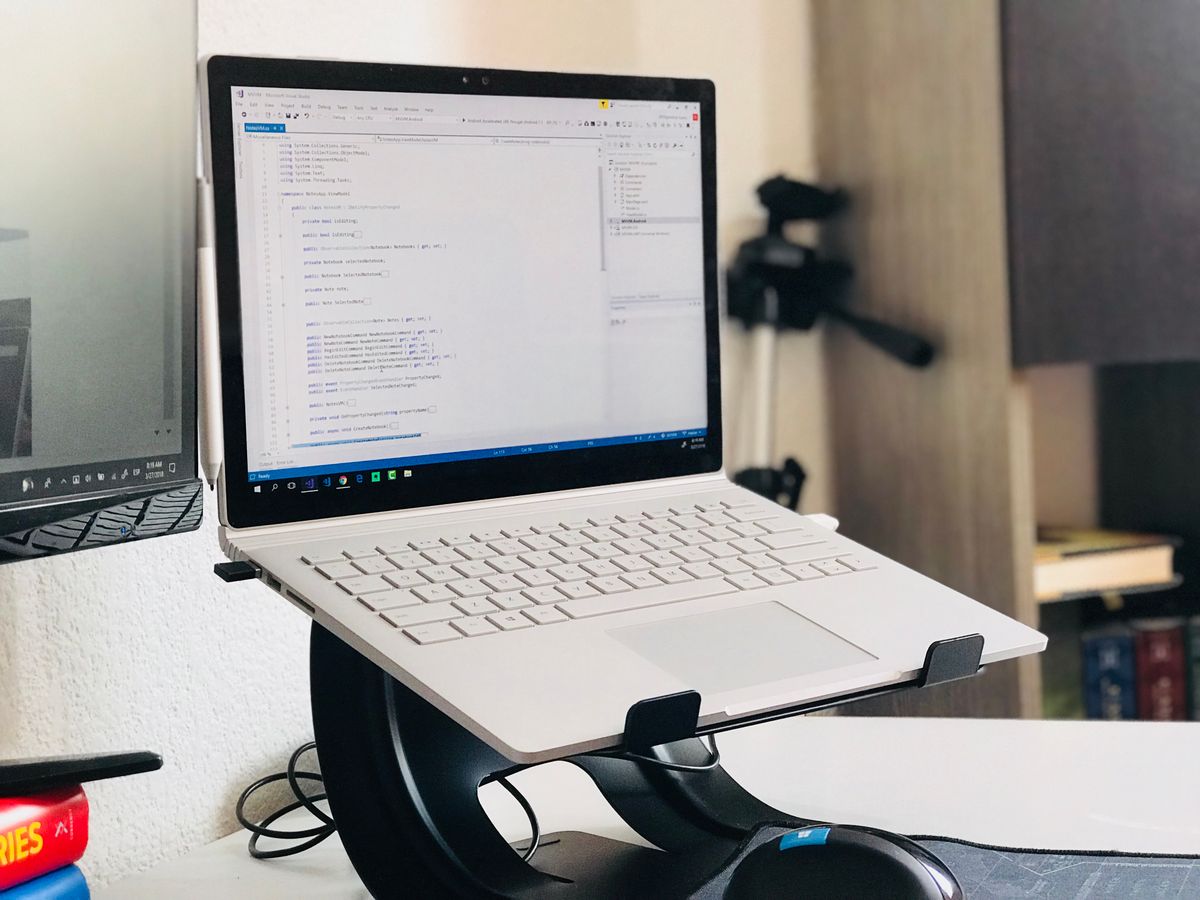 LED Desk Organizer with wireless charger on clean workspace